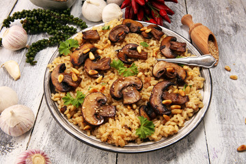 risotto with mushrooms, fresh herbs and parmesan cheese
