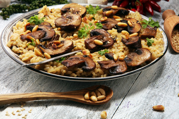 risotto with mushrooms, fresh herbs and parmesan cheese