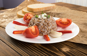 Buckwheat Porridge or Russian Kasha on Wood Rustic Background