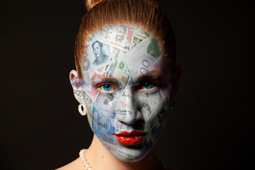 Woman face with money texture