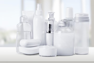 Cosmetic containers isolated on background