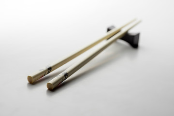 Rice chopsticks decorated on a white background