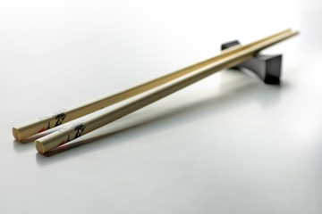 Rice chopsticks decorated on a white background