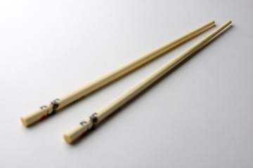 Rice chopsticks decorated on a white background