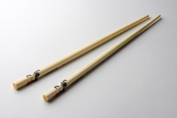 Rice chopsticks decorated on a white background