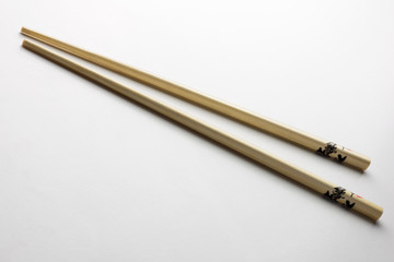 Rice chopsticks decorated on a white background