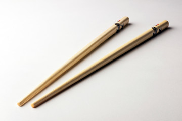 Rice chopsticks decorated on a white background
