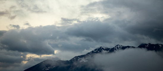 Fototapeta na wymiar Panoramic Mountain Ridge and Dramatic Clouds