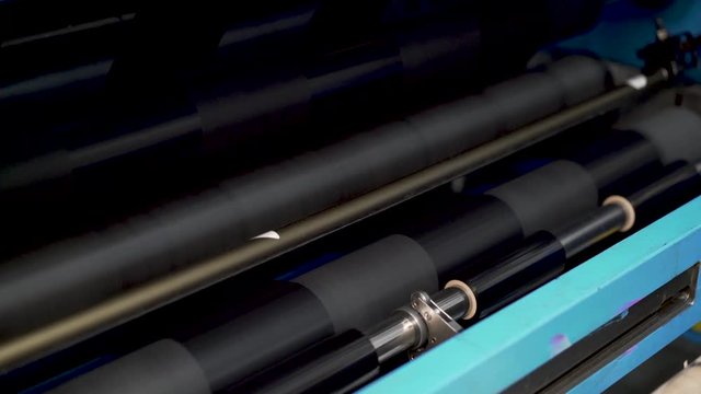 Machine working in the slitting of thermal transfer ribbon or TTR for the label industry