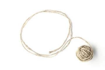 Linen grey string ball with frame made of string isolated on white background. Linen rope ball with empty frame.