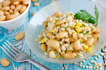 Pearl barley, white bean and corn vegetarian salad in bowl