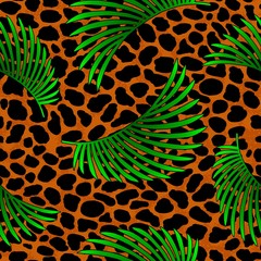 Tropical palm leaves jungle on leopard fur seamless vector pattern background