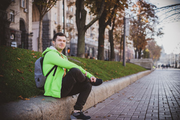 Life of simple guy, concept of young mans in big city life, desires and problems