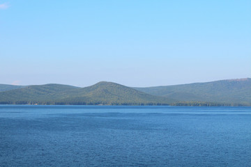 Beautiful view of the lake and the mountains. Background. Landscape.