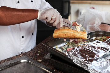 Chef cook prepares tasty meat, chicken hot chili sandwich. chef prepares kebab shaverma.