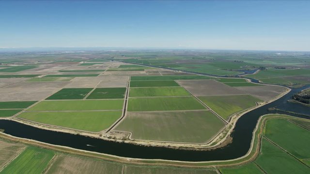 Aerial of patchwork crops river waterways agriculture USA