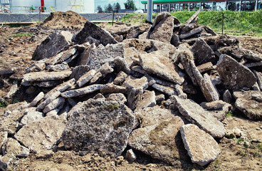 Pile of concrete debris at a building demolition site.