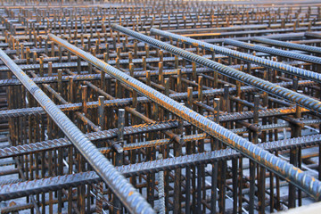 Laid reinforcement. Preparation for pouring concrete. Close-up. Creativity. - obrazy, fototapety, plakaty