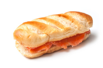 closeup of milk bread sandwich with salmon on white background