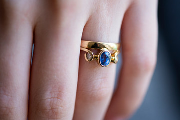 sapphire and diamond ring on hand