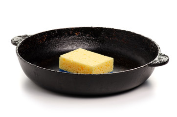 Old dirty fat pan clean sponge Isolation on a white background.