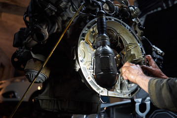 Fototapeta na wymiar Mechanic repairman working and repair car engine in car service 