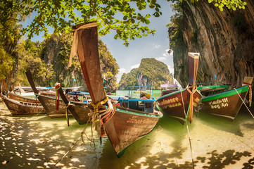 Obraz premium Tropical holidays vacation trips. Long tail boat on exotic beach