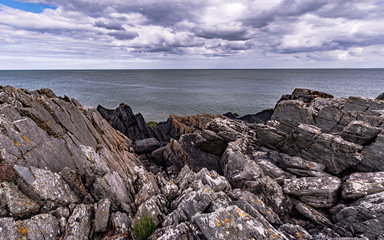Fototapeta na wymiar Clogherhead is a fishing village in County Louth, Ireland. Located in a natural bay on the East Coast it is bordered by the villages of Annagassan to the north and Termonfeckin to the south.