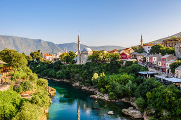 Fototapeta na wymiar Beautiful view on Mostar city with Neretva river and ancient architecture