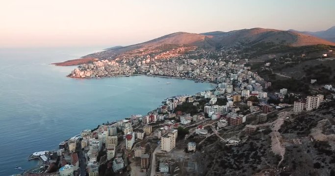 Beautiful aerial view of the city of Saranda from Lekuresi Castle at sunrise in Albania (Albanian Riviera)