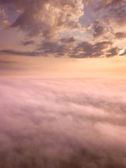 Beautiful foggy sunrise landscape from drone.