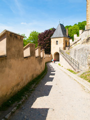 Fototapeta na wymiar First Gate, entrance to old royal gothic castle of Karlstejn, Czech Republic.