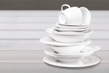 Pile of White Dishware isolated on white