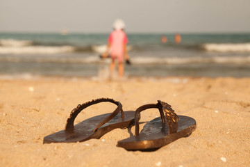 Flip-flop  on sand beach of Lake Balaton