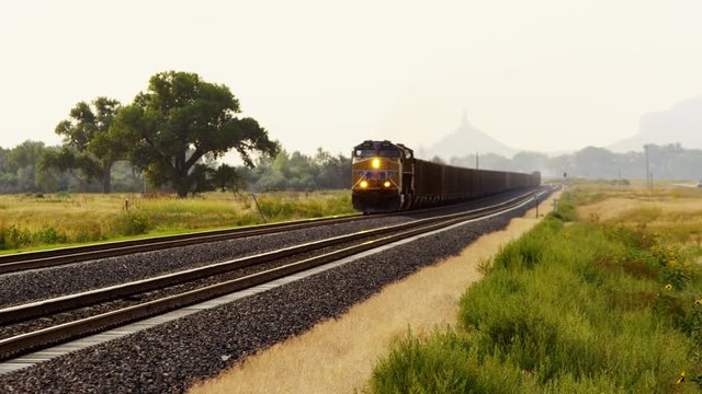 Diesel freight train locomotive near Chimney Rock Nebraska USA