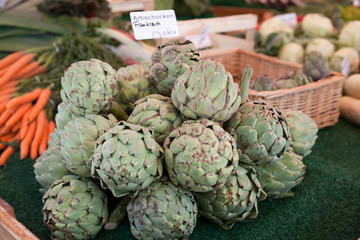 Fresh fruits artichokes at the farmers market