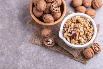 Bowl of homemade granola with nuts. Copy space