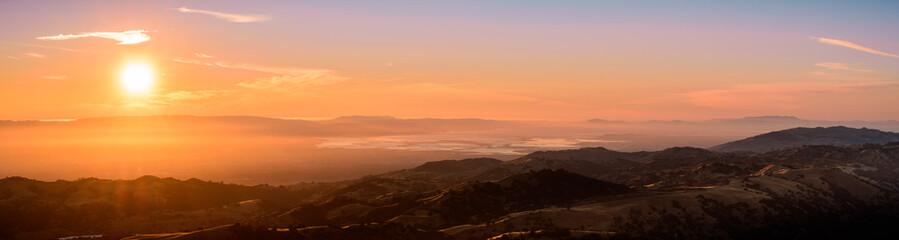 Sunset view of south San Francisco bay area and San Jose from the top of Mount Hamilton, San Jose, California - obrazy, fototapety, plakaty