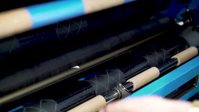 Setting the cardboard cores for slitting of thermal transfer ribbon or TTR for the label industry