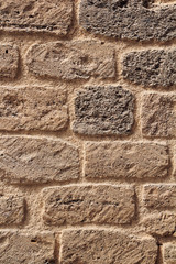 Yellow coquina bricks wall. shell rock brick wall
