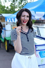 Outdoors portrait of beautiful woman on summer days