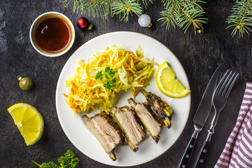 Smoked Roasted pork ribs on plate with cole slaw