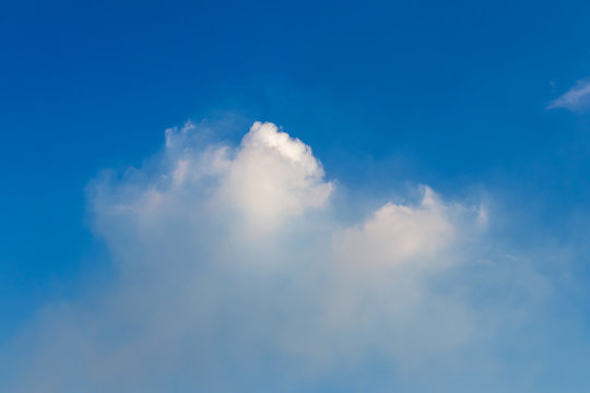 View abstract white clouds on a blue sky.
