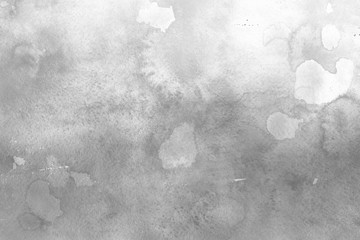 Silver watercolor background on white paper. Paint leaks and ombre effects.