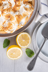 Lemon tart pie with meringue cream. Traditional American cake. Homemade baking