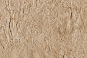- Old coffee grunge paper texture. Vintage background for design and scrapbooking. Old, compressed and crumpled effect.