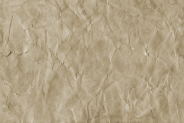 - Old coffee grunge paper texture. Vintage background for design and scrapbooking. Old, compressed and crumpled effect.