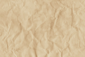 - Old coffee grunge paper texture. Vintage background for design and scrapbooking. Old, compressed and crumpled effect.