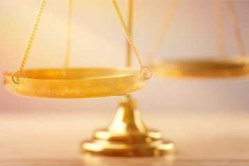 Law scales on table, close-up view