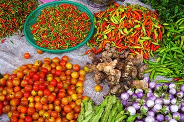 Colorful peppers and vegetables at a market in rural Southeast Asia
